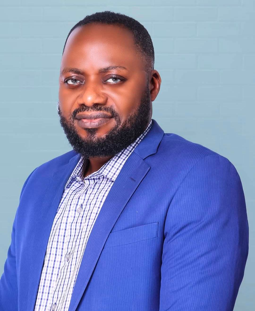 Portrait of Iliya Nkosi Smah, Strategic Partner at WalkTalk Consulting