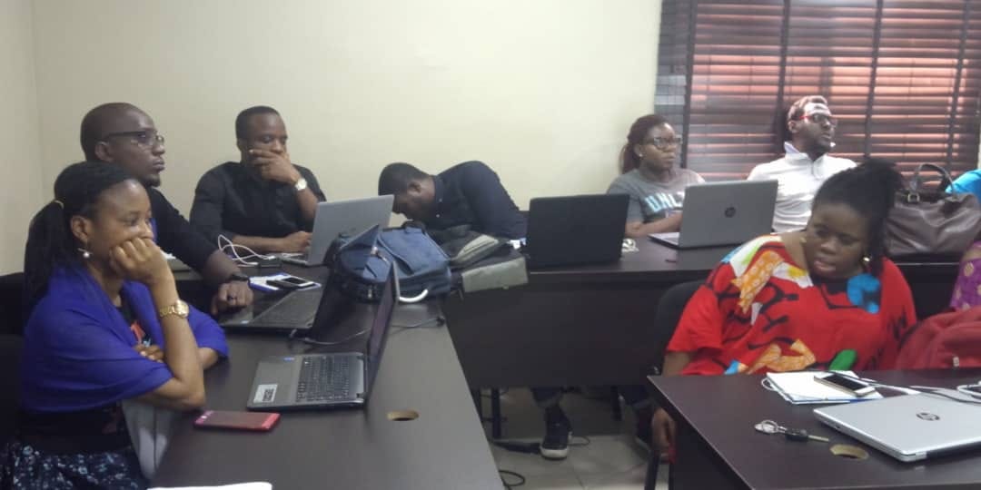 Participants listening attentively during a finance training session