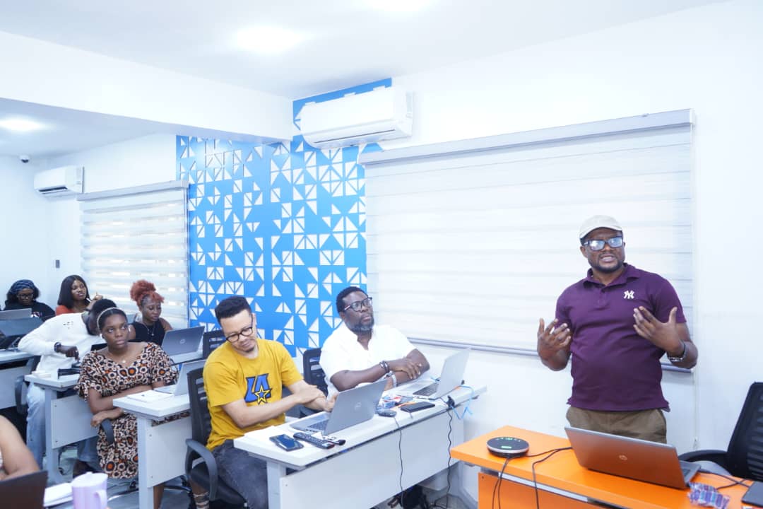 Trainer facilitating a classroom session for a corporate cohort